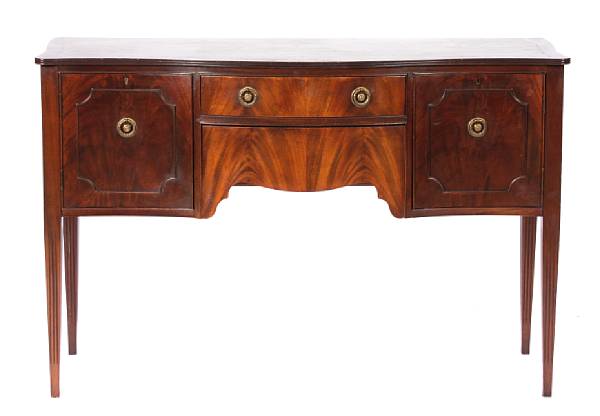 Appraisal: A George III style inlaid mahogany sideboard of serpentine outline