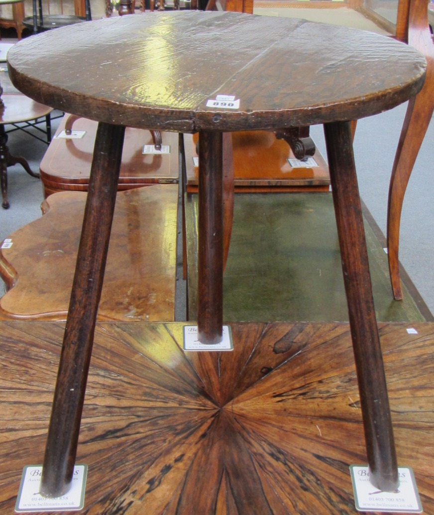 Appraisal: An th century occasional table the deep circular elm top