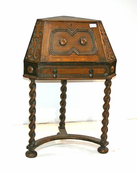 Appraisal: A Baroque style oak corner fall front secretary composed of