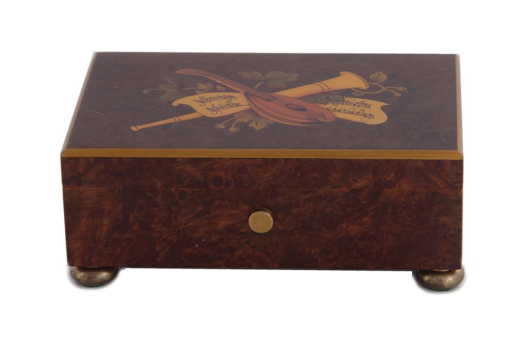 Appraisal: Reuge two-tune music box with musical motif inlay Lara's Theme