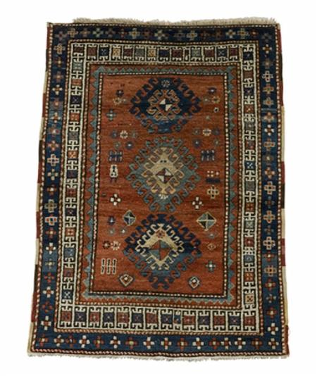 Appraisal: A Kazak rug late th early th century the red