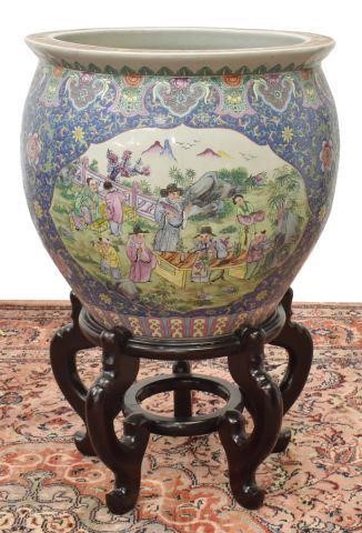 Appraisal: Chinese famille rose porcelain fishbowl and stand interior decorated with