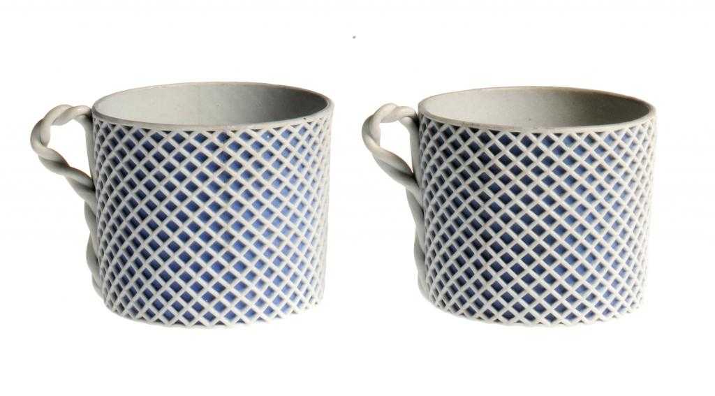 Appraisal: A PAIR OF WEDGWOOD WHITE JASPER WARE CUSTARD CUPS in