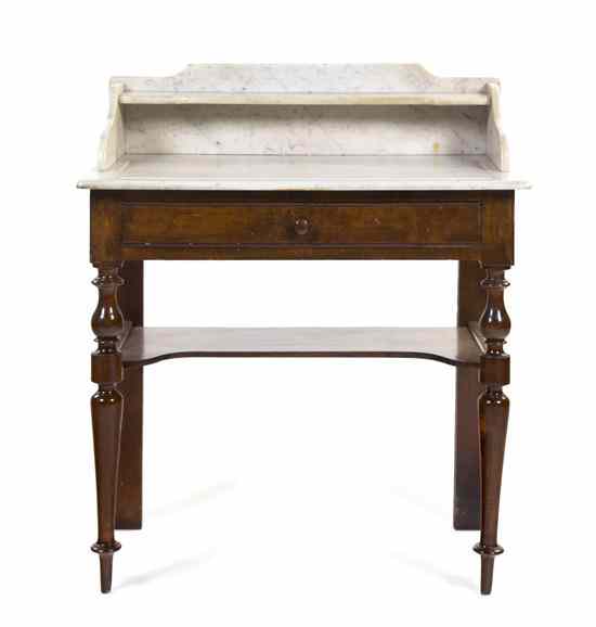 Appraisal: A French Victorian Mahogany and Marble Washstand having a shaped