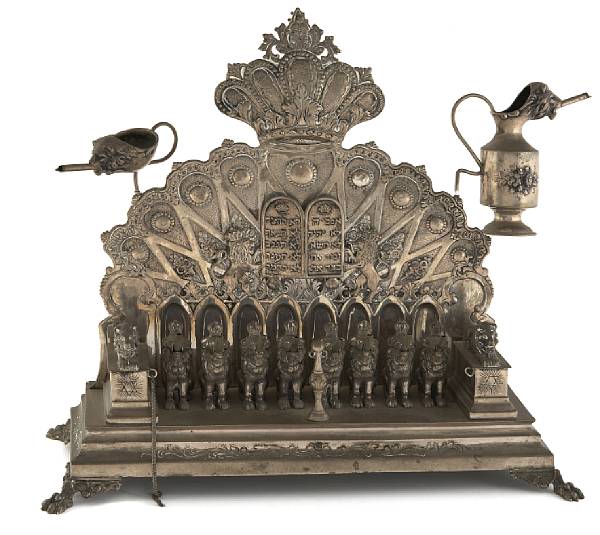 Appraisal: A German standard silver menorah after the antique Height in