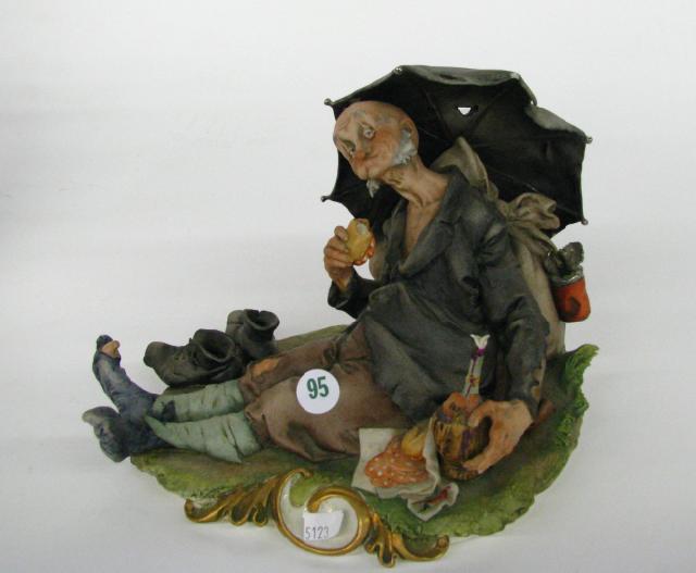 Appraisal: G Cappe Italian bisque porcelain figurine depicting an old hobo