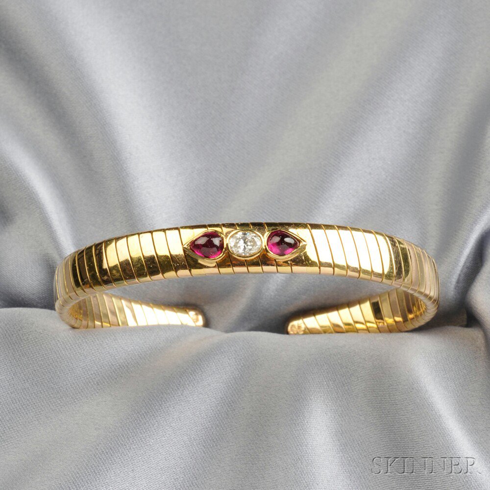 Appraisal: kt Bicolor Gold Ruby and Diamond Bracelet the tapering tubogas