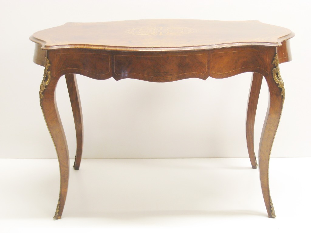 Appraisal: A th Century walnut Centre Table having shaped top with