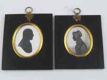 Appraisal: A painted on ivory oval silhouette of a lady and