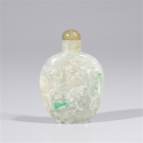 Appraisal: Antique Chinese carved jadeite snuff bottle circa floral designs in