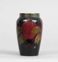 Appraisal: Early th Century Moorcroft Pomegranate Vase The silver collar at