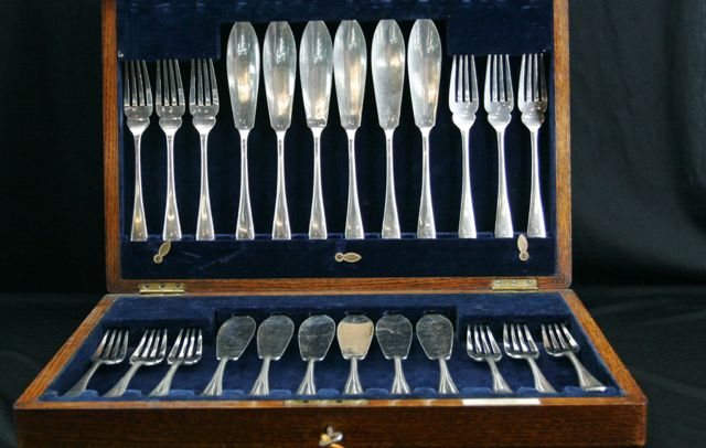 Appraisal: A cased silver plated fish service for twelve including twelve