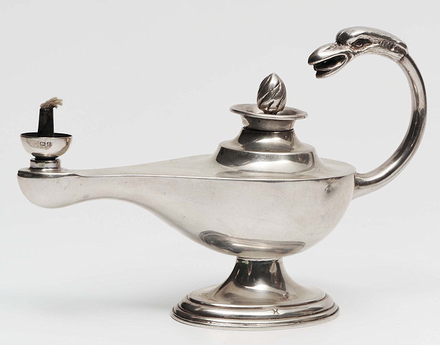 Appraisal: AN EARLY TH CENTURY SILVER CIGAR LIGHTER in the form