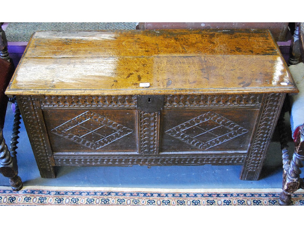 Appraisal: A late th century oak coffer the wide plank lid