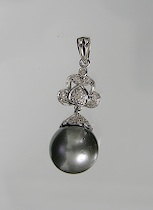 Appraisal: Tahitian Pearl and Diamond Pendant K white gold pendant with