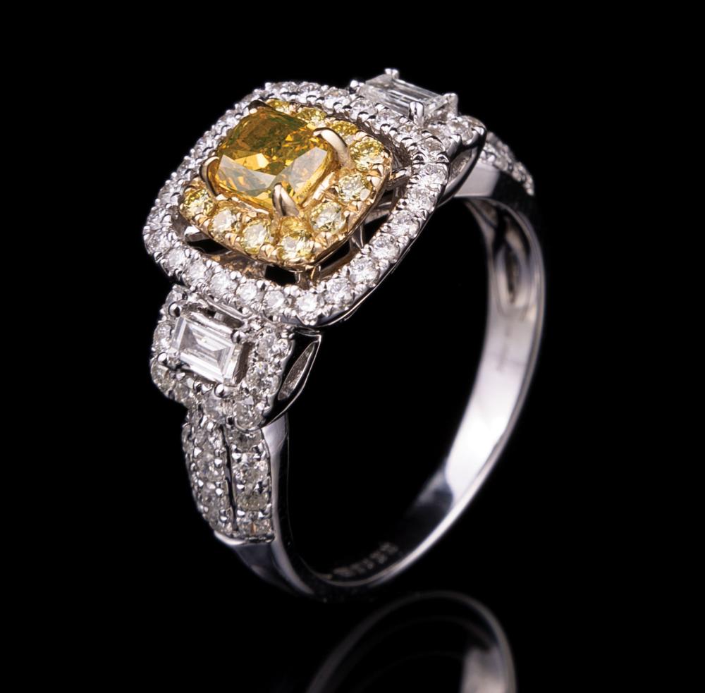 Appraisal: kt White Gold Yellow Diamond and Diamond Ring central prong