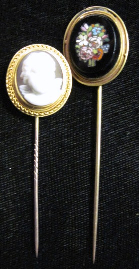 Appraisal: Two stick pinsOne featuring high relief puti cameo the other