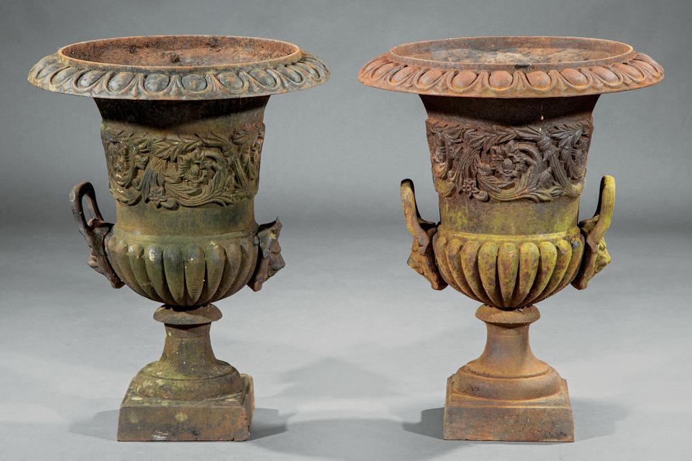 Appraisal: Pair of American Cast Iron Urns th c en suite