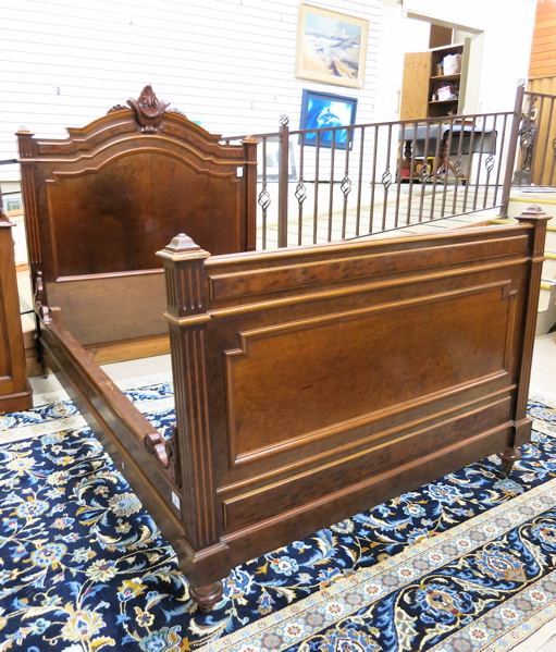 Appraisal: A VICTORIAN MAHOGANY AND WALNUT BED WITH RAILS Louis XVI