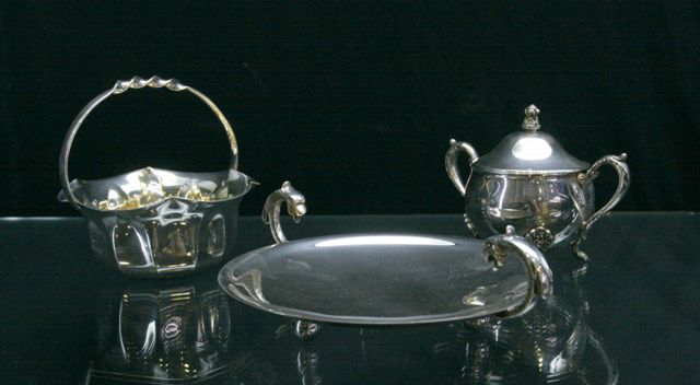 Appraisal: An assortment of silverplated items including a teapot vase tazzas