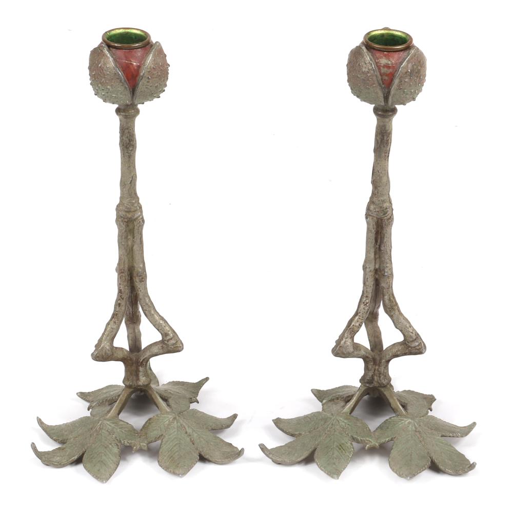 Appraisal: PAIR AESTHETIC VICTORIAN NATURALISTIC PATINATED METAL FIGURAL BRANCH FORM CANDLESTICKS