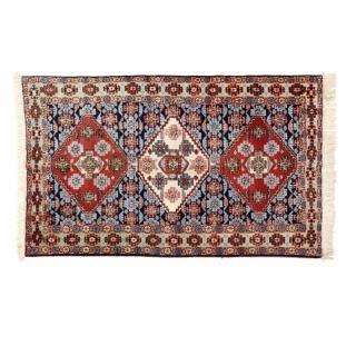 Appraisal: Pak Kazak Area Rug with three octagonal medallions on blue