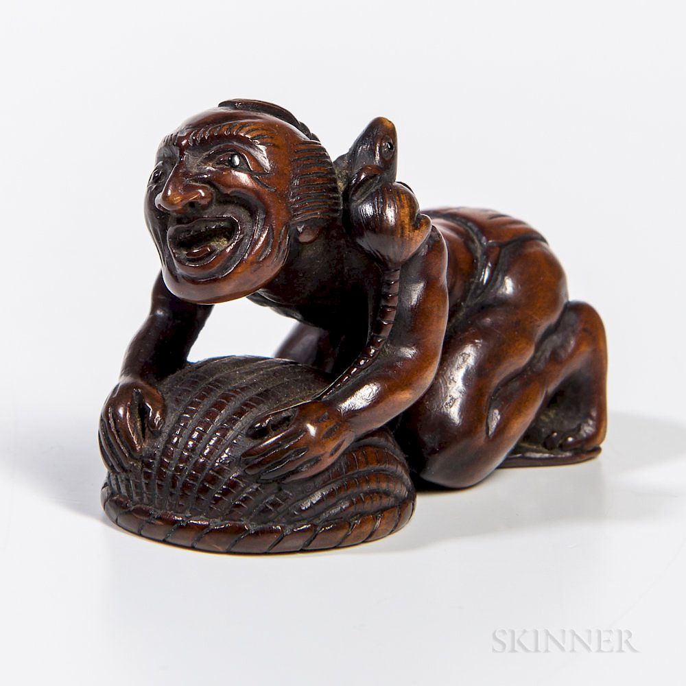 Appraisal: Carved Boxwood Netsuke Carved Boxwood Netsuke Japan th century the