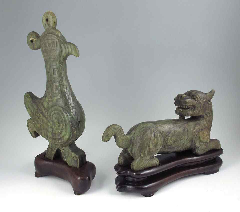 Appraisal: CARVED SOAPSTONE ORIENTAL ANIMAL FIGURES WITH STANDS Bird ''h x