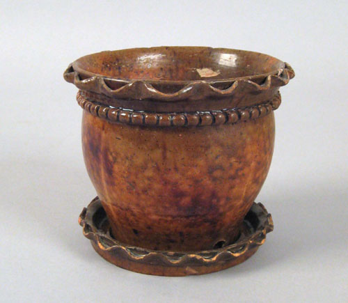 Appraisal: Pennsylvania redware flower pot th c with ruffled rim and