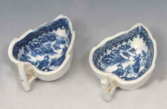 Appraisal: A PAIR OF CAUGHLEY SALOPIAN BLUE AND WHITE PORCELAIN BUTTER