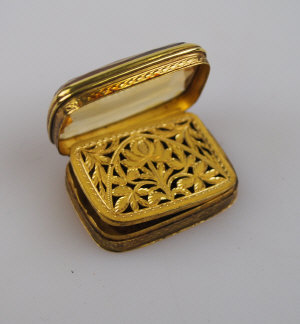 Appraisal: Rectangular gold engine turned vinaigrette having faceted citrine cover pierced