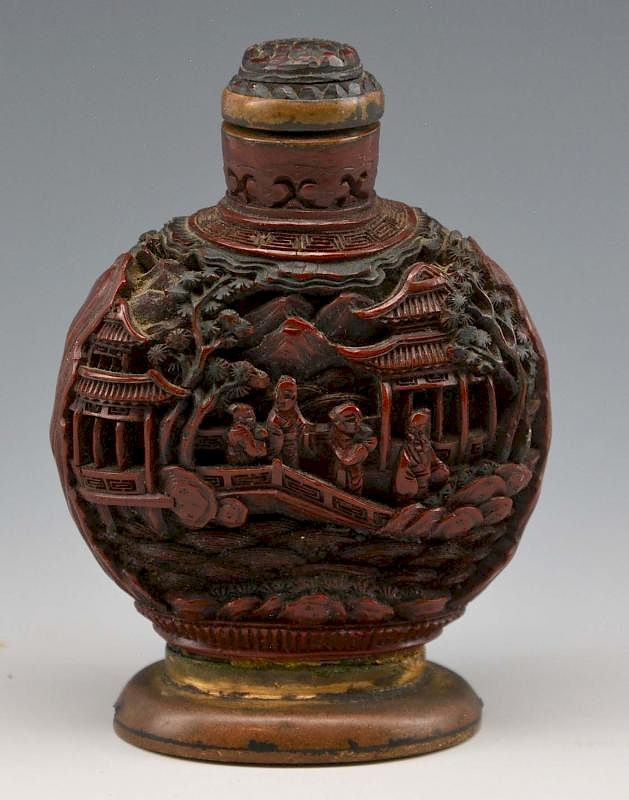 Appraisal: Chinese carved lacquer snuff bottle Chinese carved lacquer snuff bottle