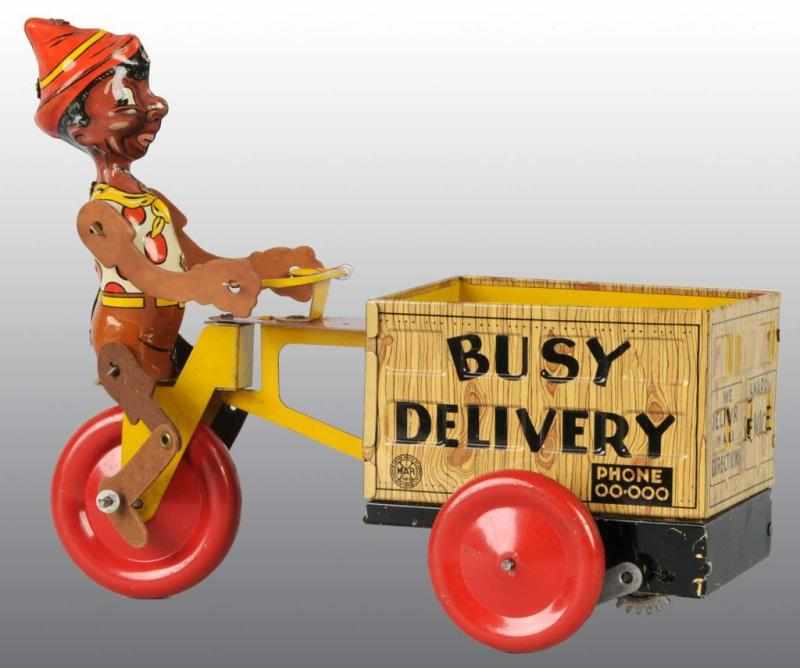 Appraisal: Tin Marx Pinocchio Delivery Wagon Wind-Up Toy Description American Working