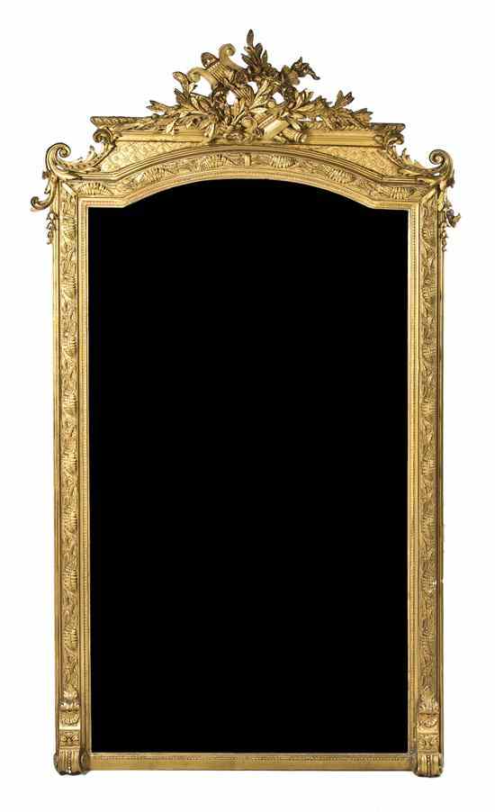 Appraisal: A Louis XVI Style Giltwood Pier Mirror having a pierce