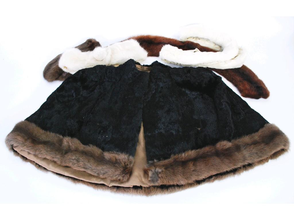 Appraisal: LADY'S BLACK MOLE SKIN CAPE with squirrel trim fake fur