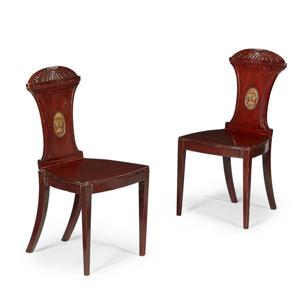 Appraisal: PAIR OF REGENCY MAHOGANY ARMORIAL HALL CHAIRS EARLY TH CENTURY