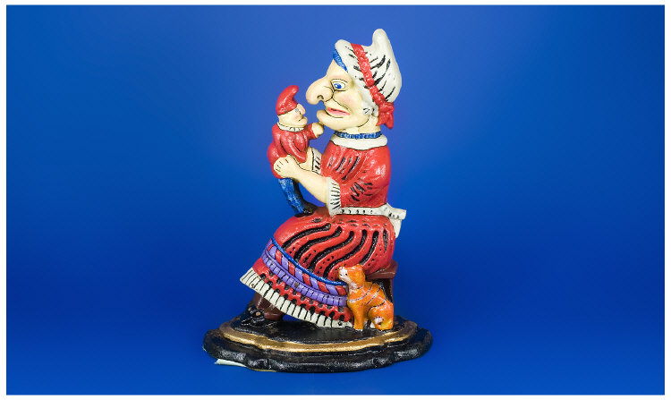 Appraisal: Cast Iron Doorstep Judy Of Punch and Judy With Polychrome