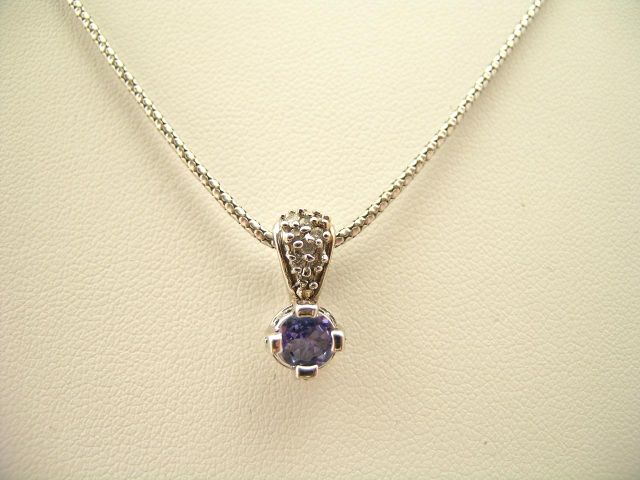 Appraisal: K white gold pendant with tanzanite and accent diamonds with