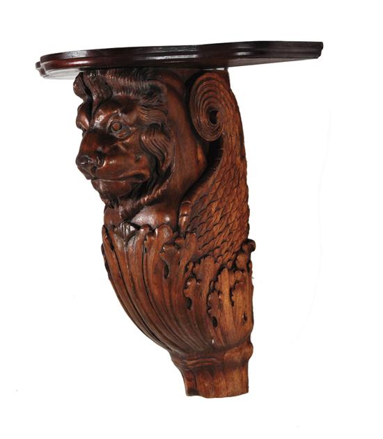 Appraisal: Continental figural carved bracket late th century serpentine shelf supported