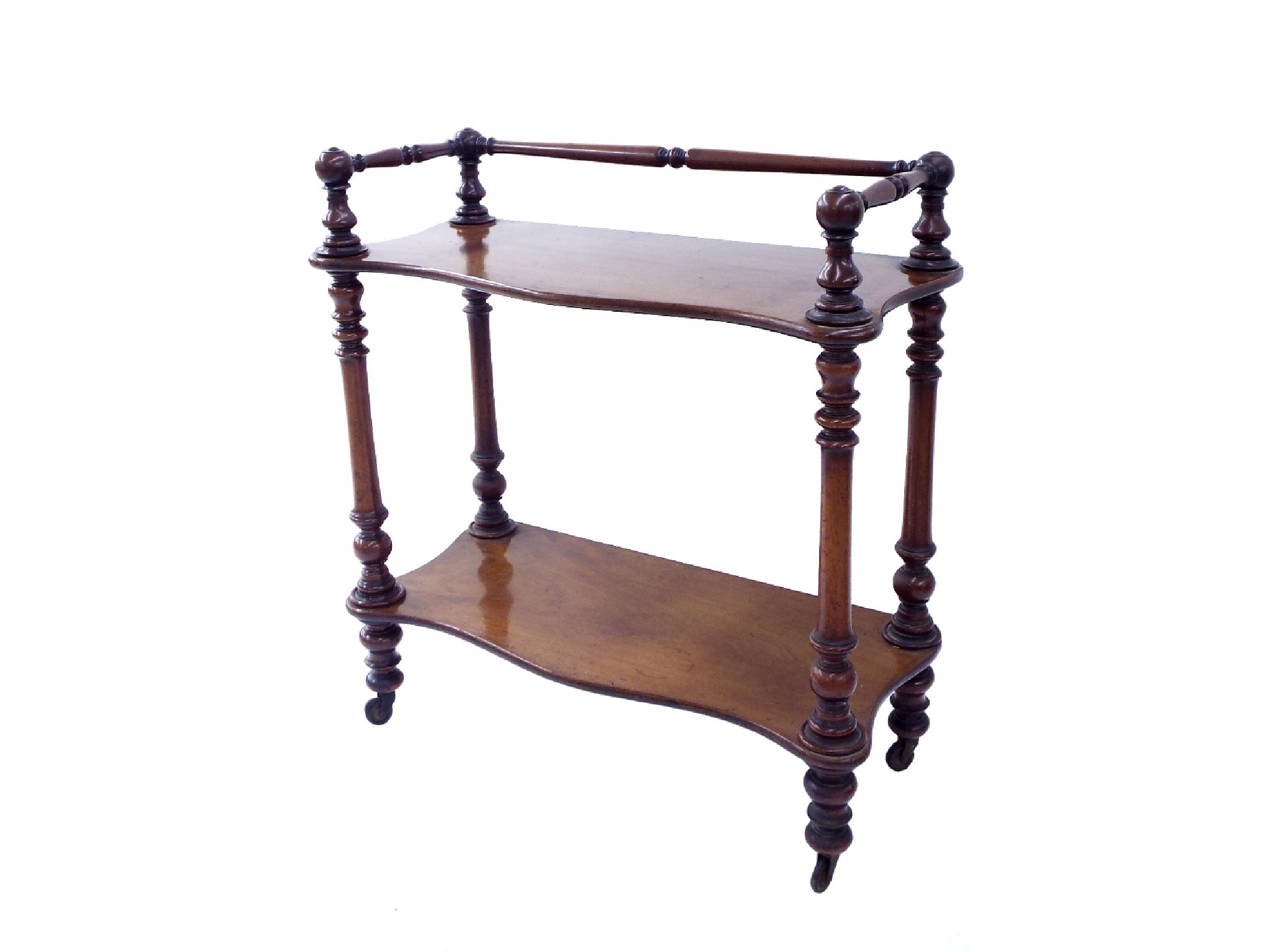 Appraisal: Victorian mahogany and serpentine two tier waiter with a raised