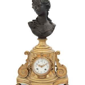 Appraisal: A French Gilt and Patinated Bronze Clock with a Bust