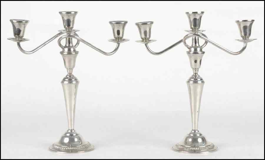 Appraisal: PAIR OF INTERNATIONAL WEIGHTED STERLING SILVER THREE-LIGHT CANDELABRA Candelabra unscrew