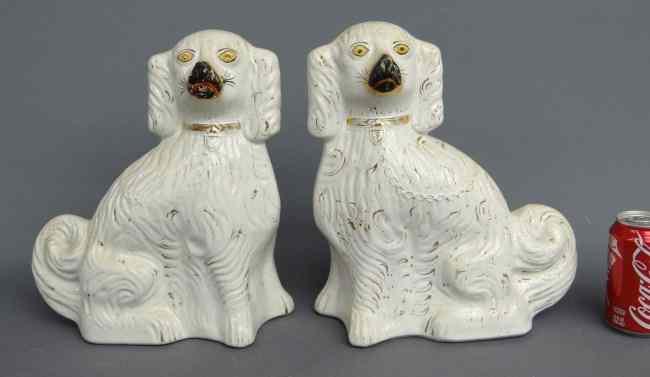 Appraisal: Pair th c Staffordshire spaniels '' Ht One as is