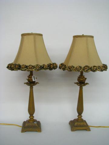 Appraisal: Pair of rose motif gold painted boudoir lamps with matching