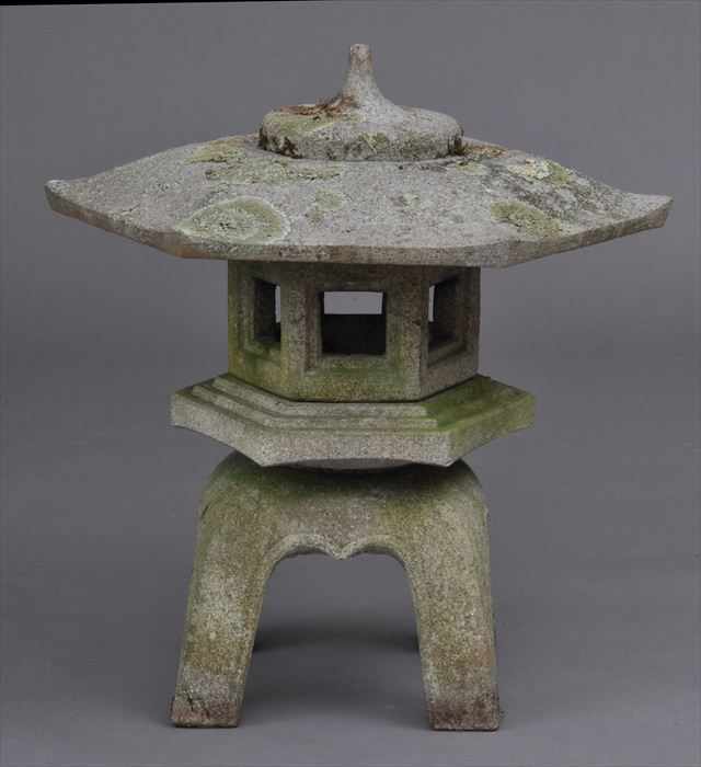 Appraisal: JAPANESE CARVED GRANITE GARDEN LANTERN The hexagonal pagoda roof on