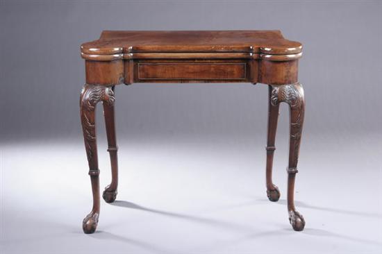 Appraisal: GEORGE II WALNUT FLIP-TOP CARD TABLE th century Turret-corner rectangular