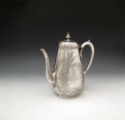 Appraisal: A Victorian silver coffee pot by Martin Hall and Company