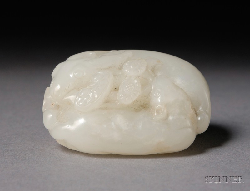 Appraisal: Jade Pendant China th century pebble form carved as a