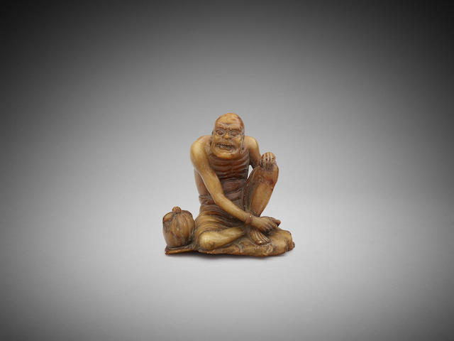 Appraisal: A Chinese soapstone carving of a lohan cm high