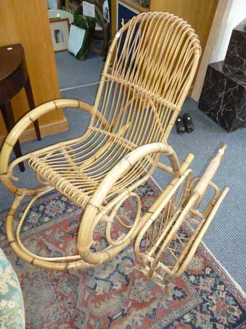 Appraisal: A BAMBOO CANE ROCKING CHAIR together with a caned magazine